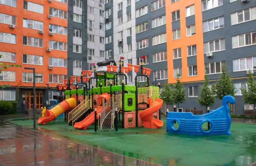 Children enjoying open play spaces in NBR Group apartments in Gunjur